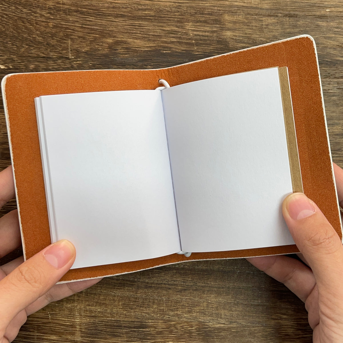 Notebook open with blank pages