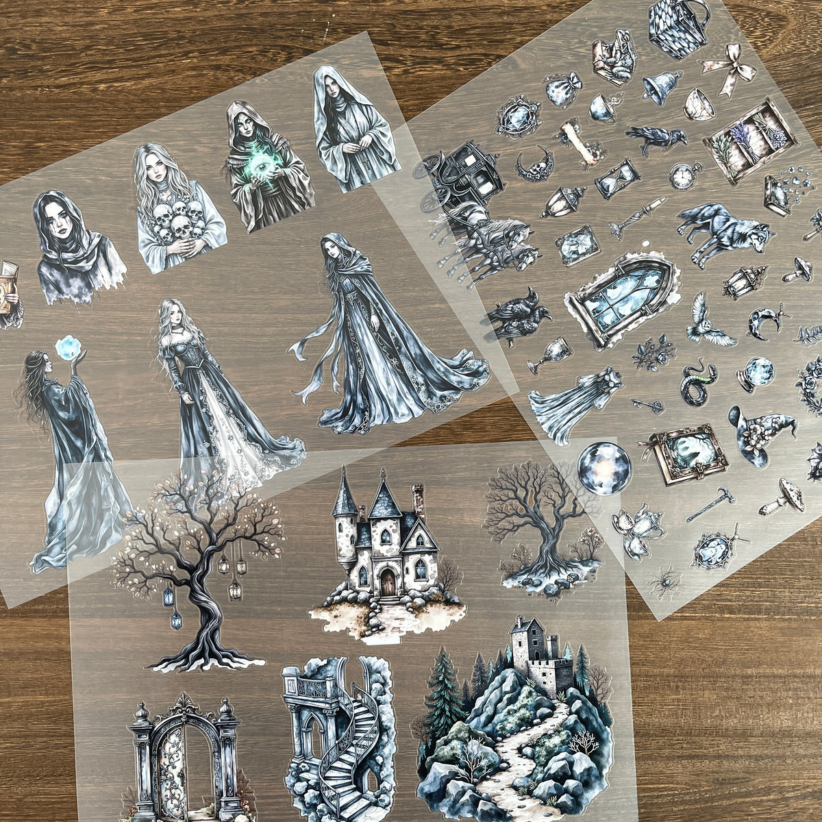 Three gray witch sticker sheets