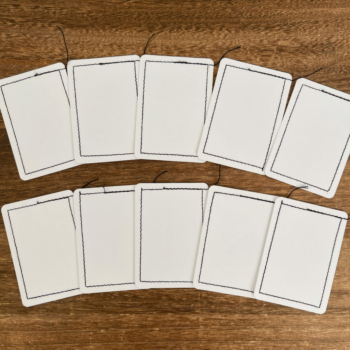 Ten stitched border cards