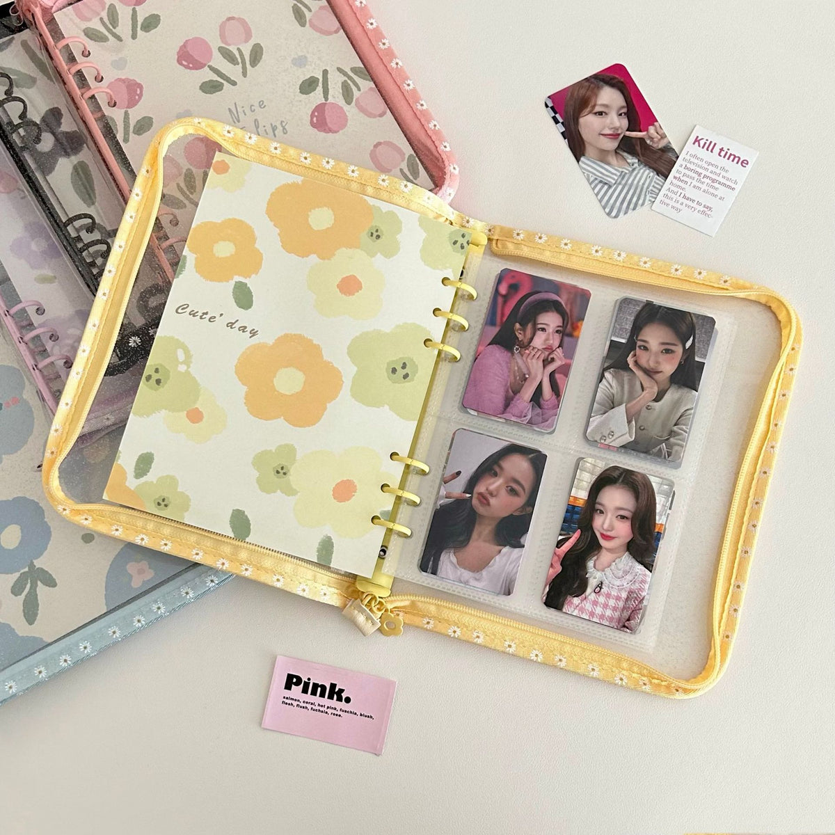 Yellow binder open with photo cards