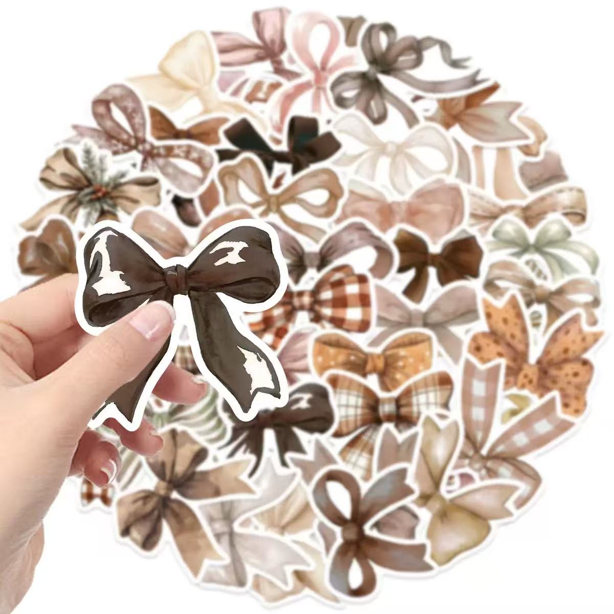 0614 50 Brown bow Stickers solid with white border