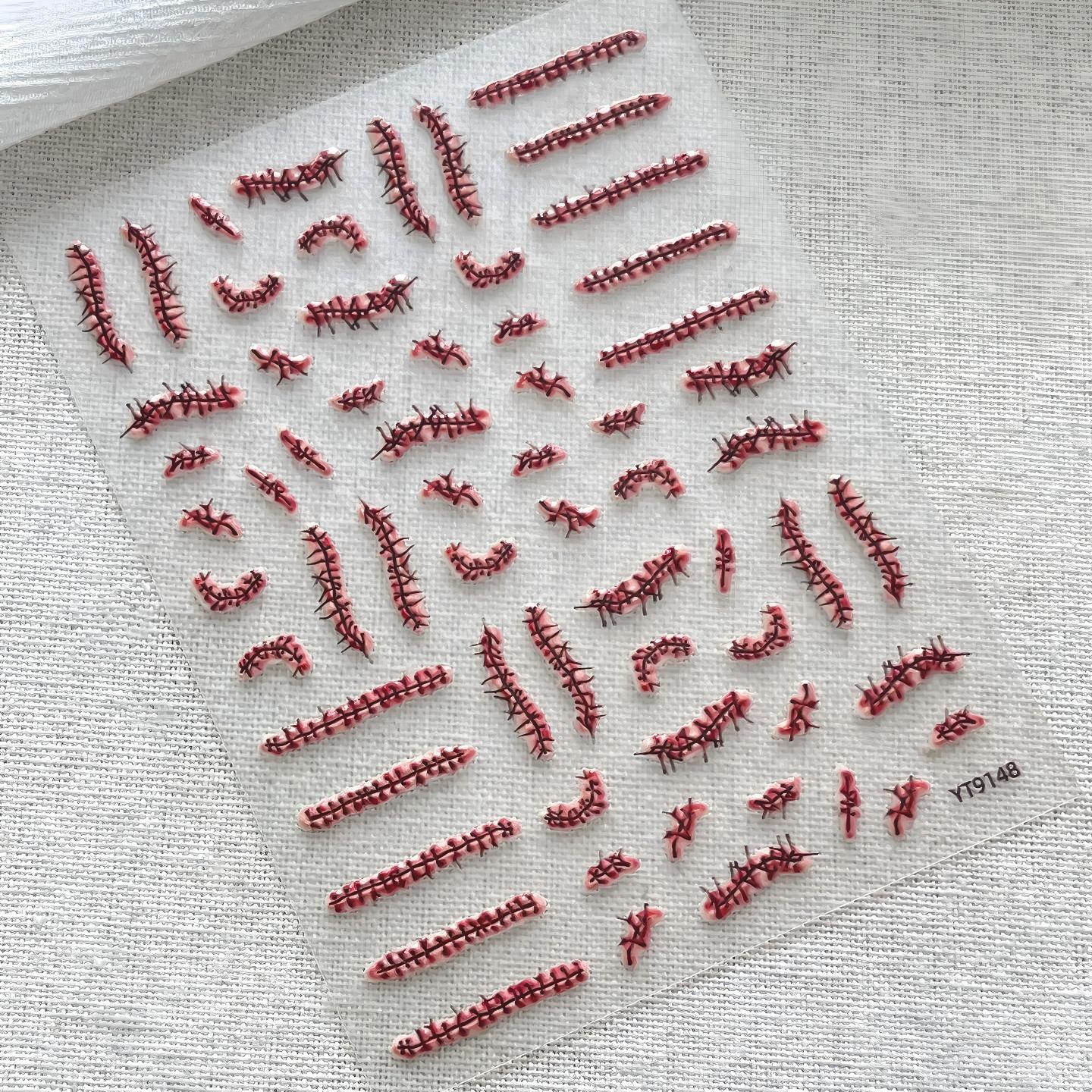 M342- Sutured Wounds Embossed Mini sticker 1 Pcs