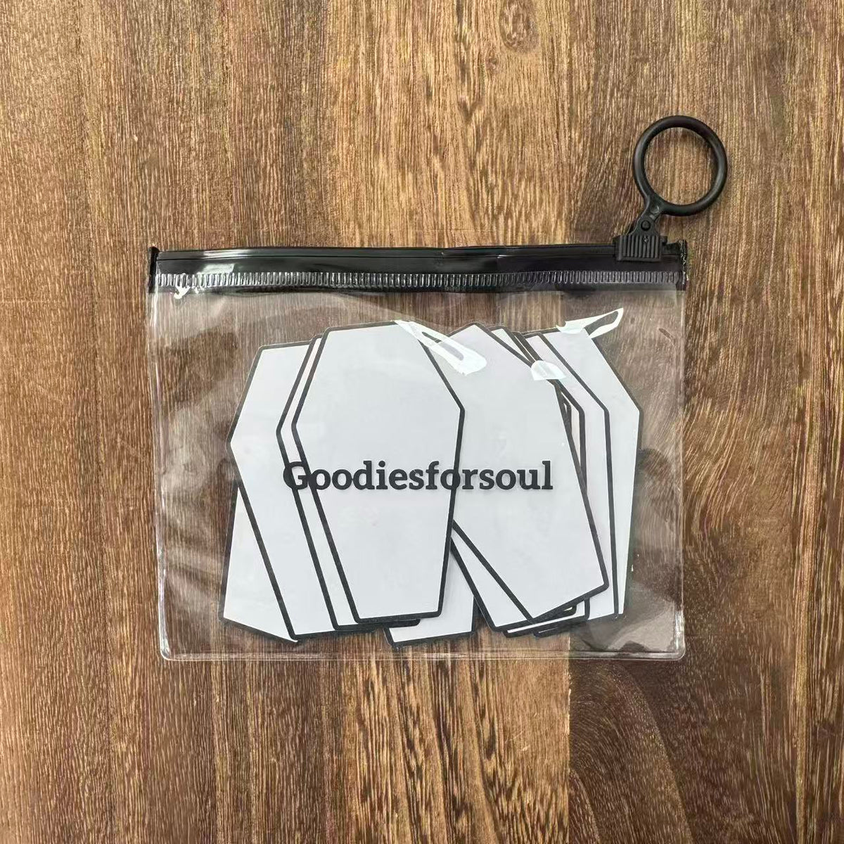 Coffin cards in bag