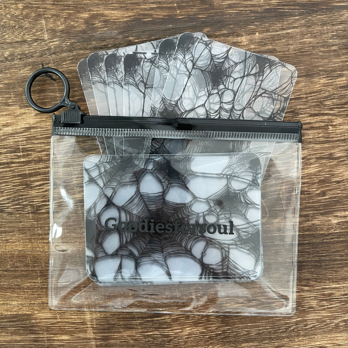 Spider web clear ATC cards in a zip pouch