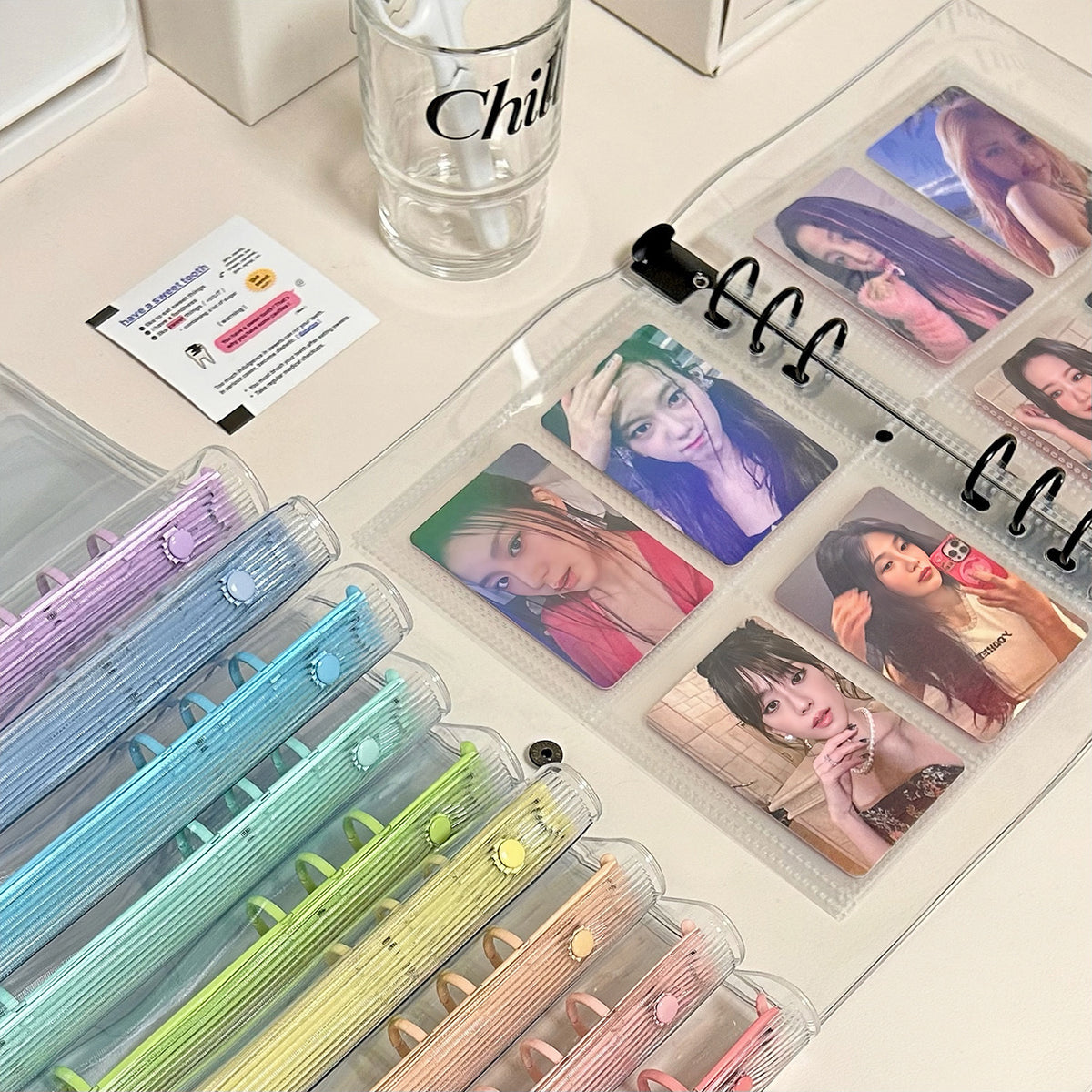 Row of clear binders in many ring colors