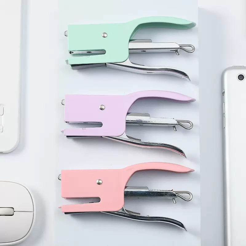 Staplers lined up