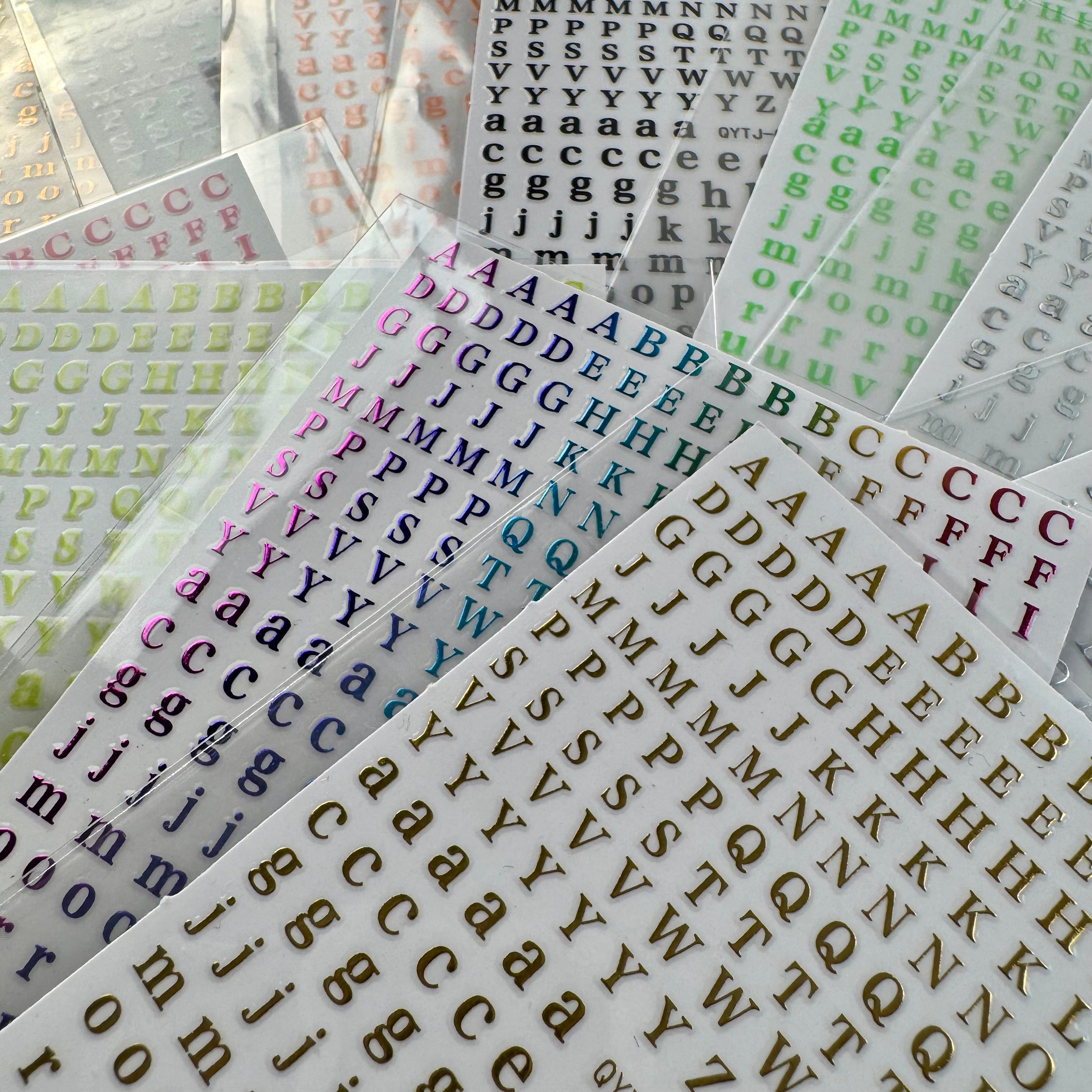 M302- Mini embossed letter sticker 1 set 11 pack